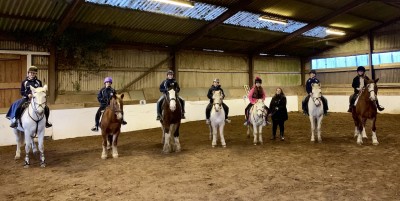 Brookes UK students enjoying a horse riding lesson